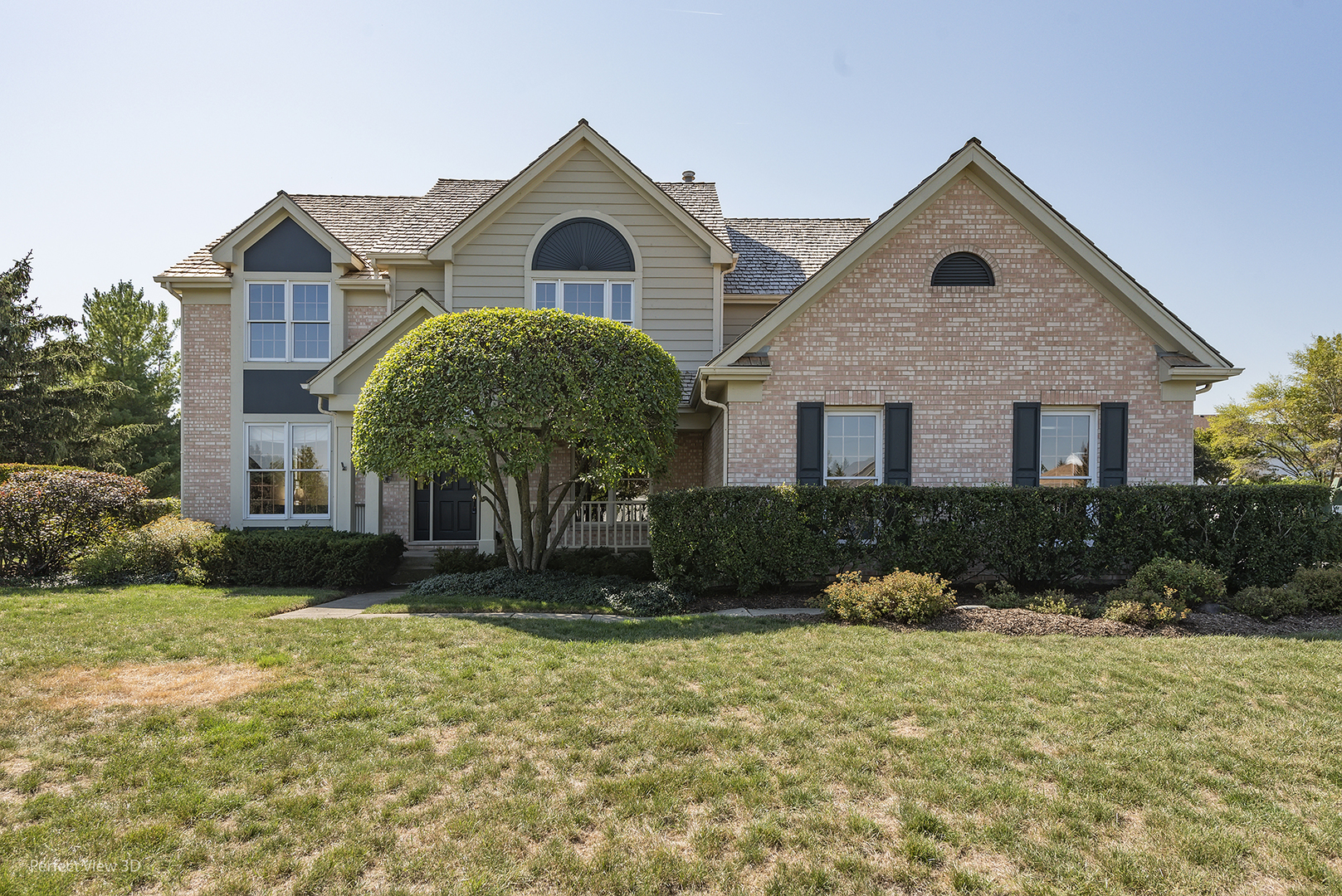 17929 West Pond Ridge Circle Gurnee, IL 60031 - Photo 1 of 28 a front view of a house with garden