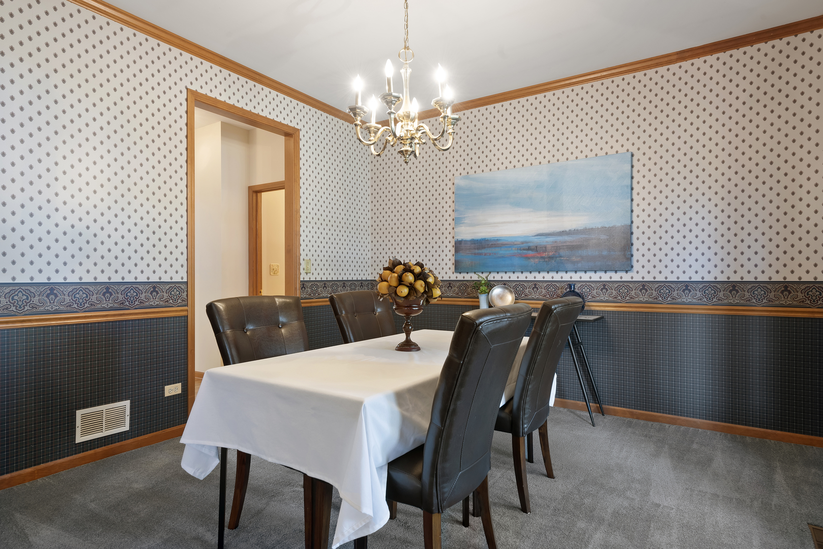 17929 West Pond Ridge Circle Gurnee, IL 60031 - Photo 14 of 28 a view of a dining room with furniture and chandelier