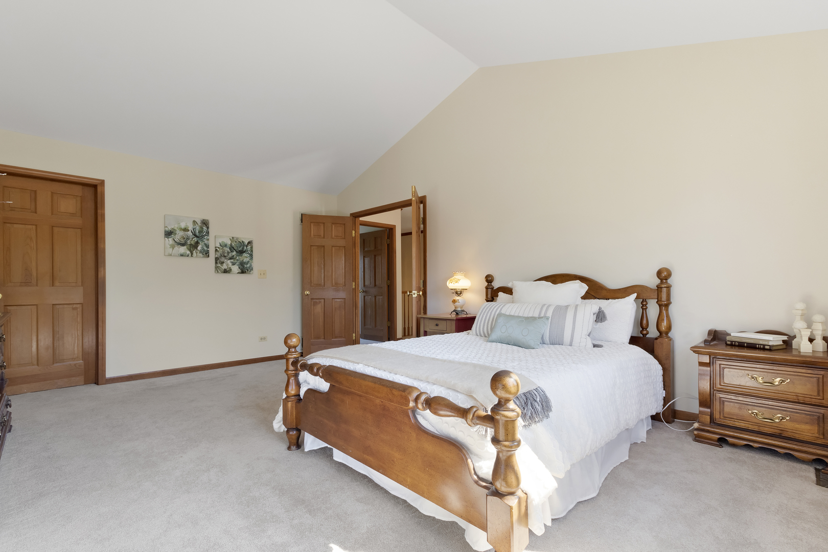 17929 West Pond Ridge Circle Gurnee, IL 60031 - Photo 16 of 28 a bedroom with a bed and painting on the wall
