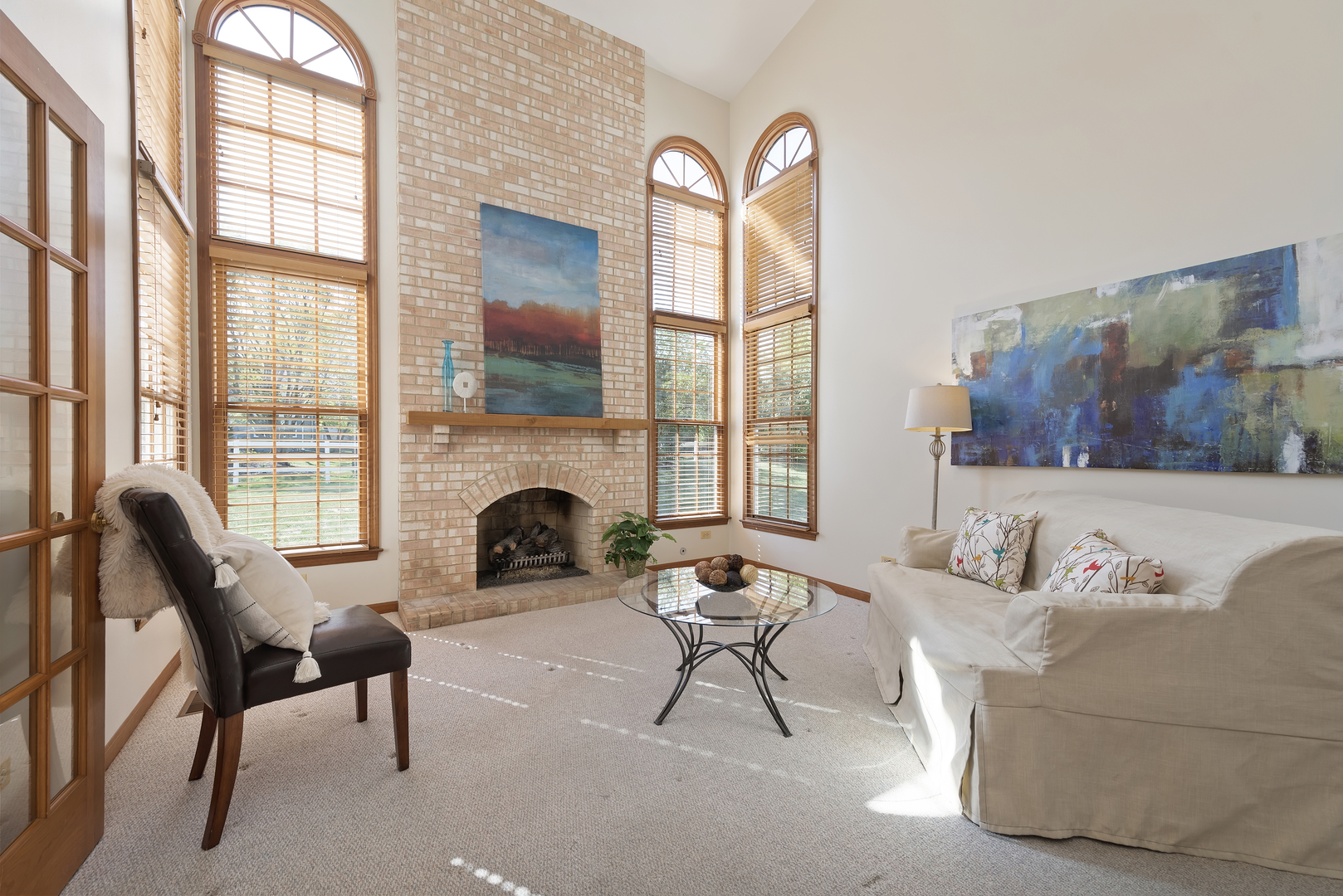 17929 West Pond Ridge Circle Gurnee, IL 60031 - Photo 3 of 28 a living room with furniture and a fireplace