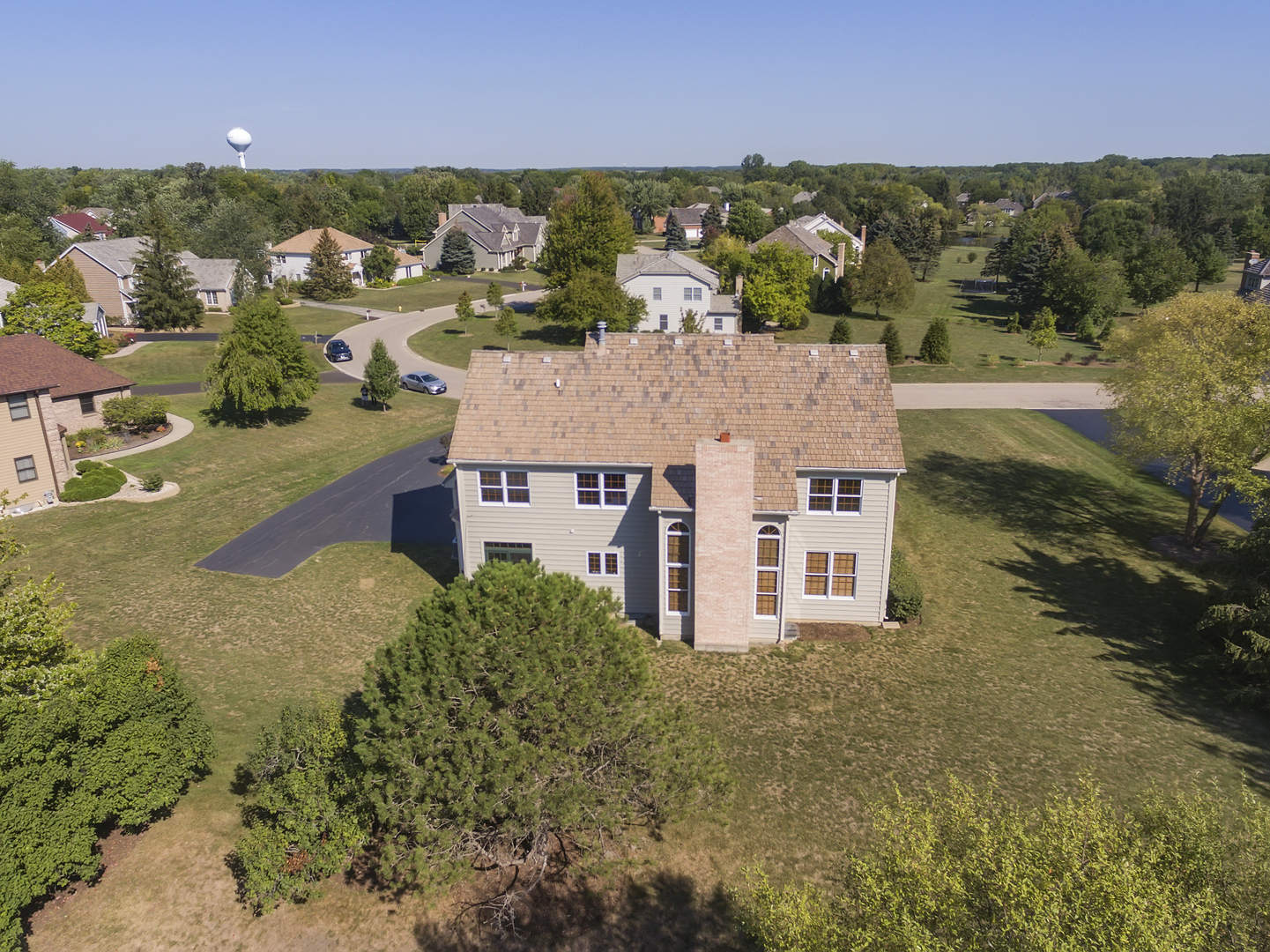 17929 West Pond Ridge Circle Gurnee, IL 60031 - Photo 26 of 28 an aerial view of residential houses with outdoor space and trees