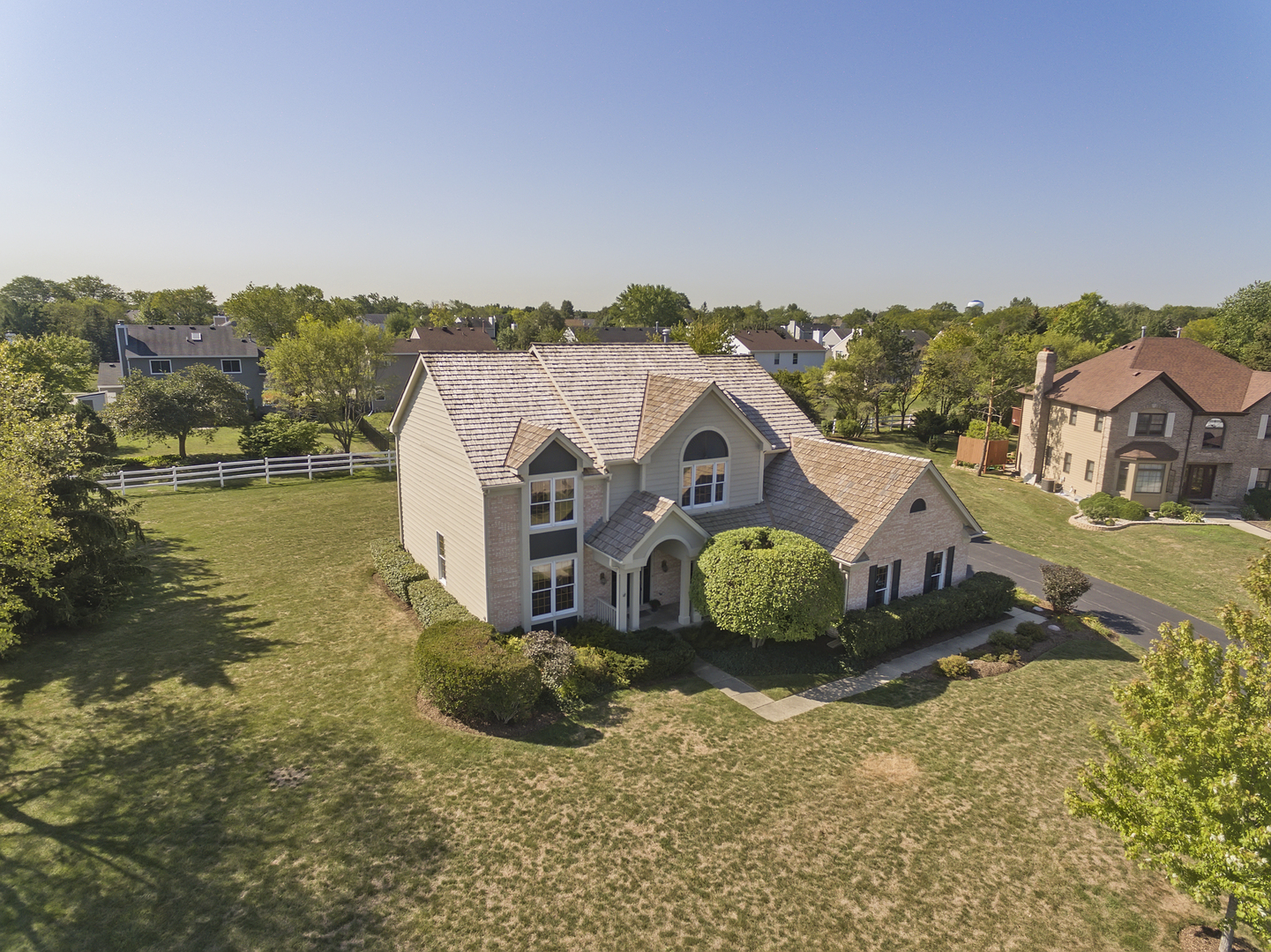 17929 West Pond Ridge Circle Gurnee, IL 60031 - Photo 27 of 28 a view of a house with a yard and sitting area