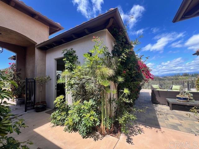 13495 Del Poniente Road Poway, CA 92064 - Photo 46 of 60 a backyard of a house with outdoor seating