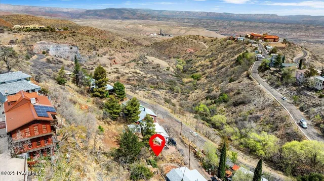 an aerial view of beach and city