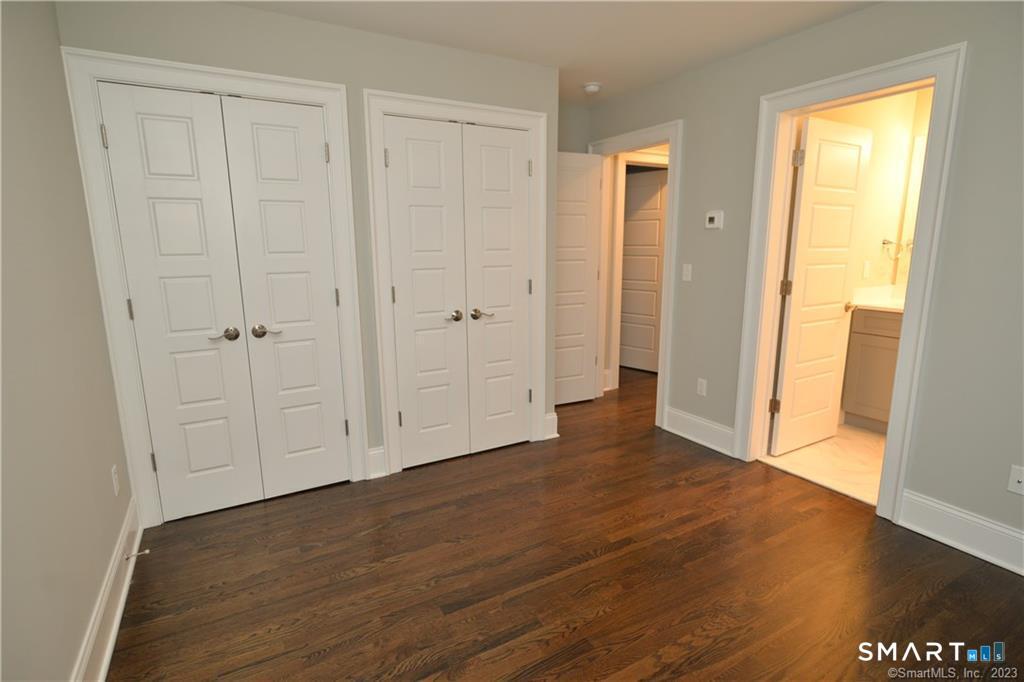115-71 Colonial Road Stamford, CT 06906 - Photo 14 of 29 Bedroom with full bath
