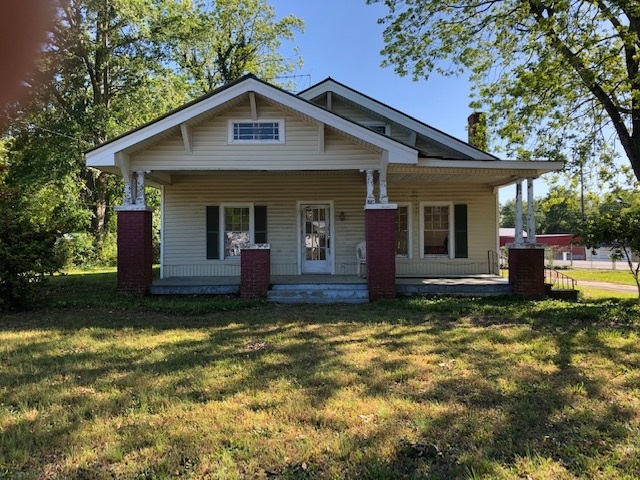 38 Old Elbert Road, Unit 1 Royston, GA 30662 - Photo 1 of 1 a view of a house with a yard and large tree