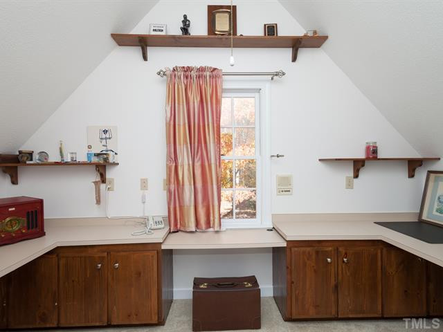 1929 Partridge Berry Drive Raleigh, NC 27606 - Photo 21 of 25 A door from the bonus opens into the office with built-in desks. Studio/Study/Office