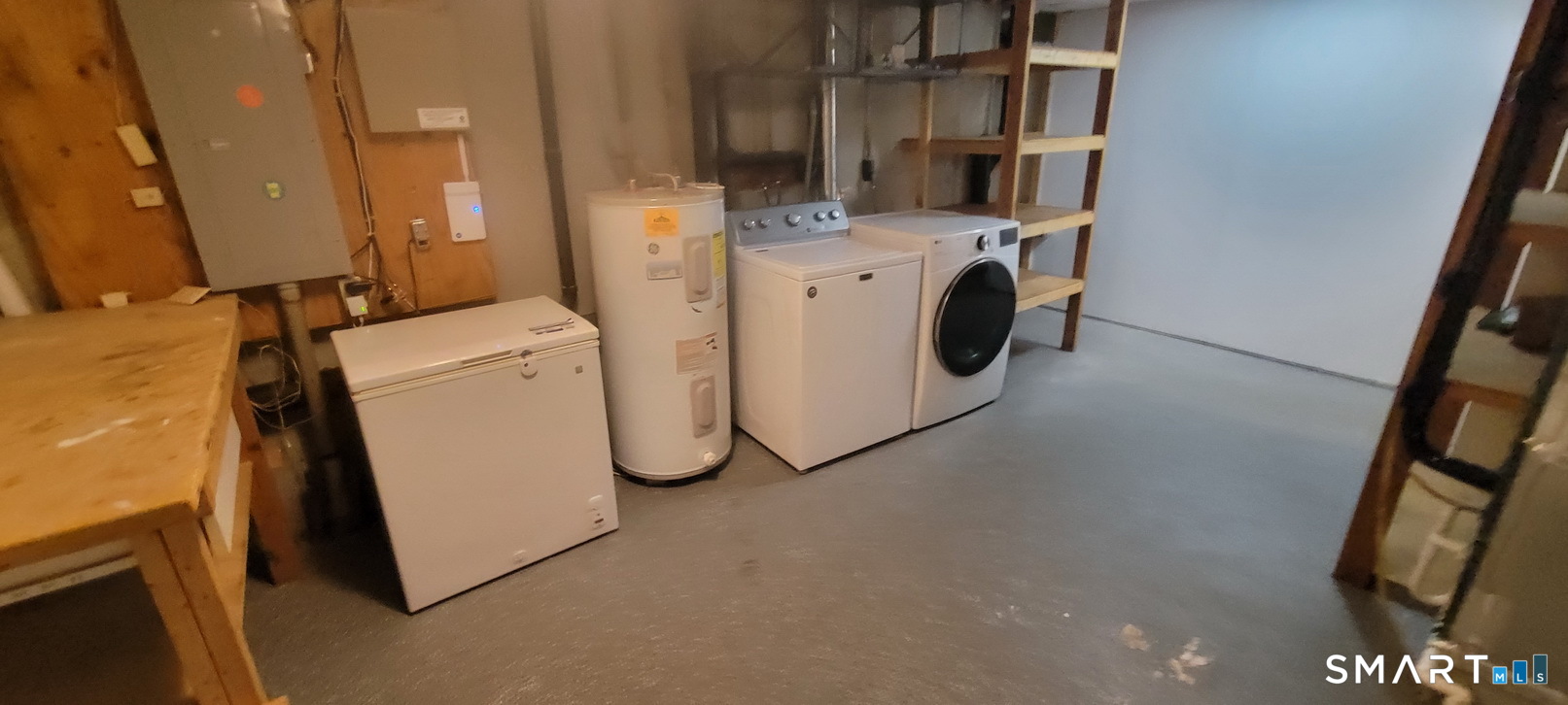 166 Old Brookfield Road, Unit 314 Danbury, CT 06811 - Photo 33 of 37 a utility room with dryer and washer