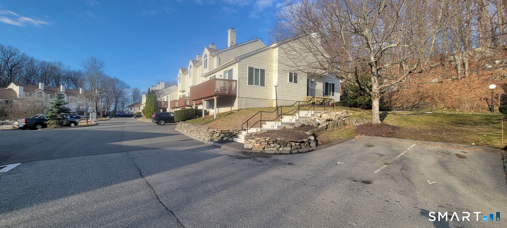 166 Old Brookfield Road, Unit 314 Danbury, CT 06811 - Photo 37 of 37 a view of a house with a yard