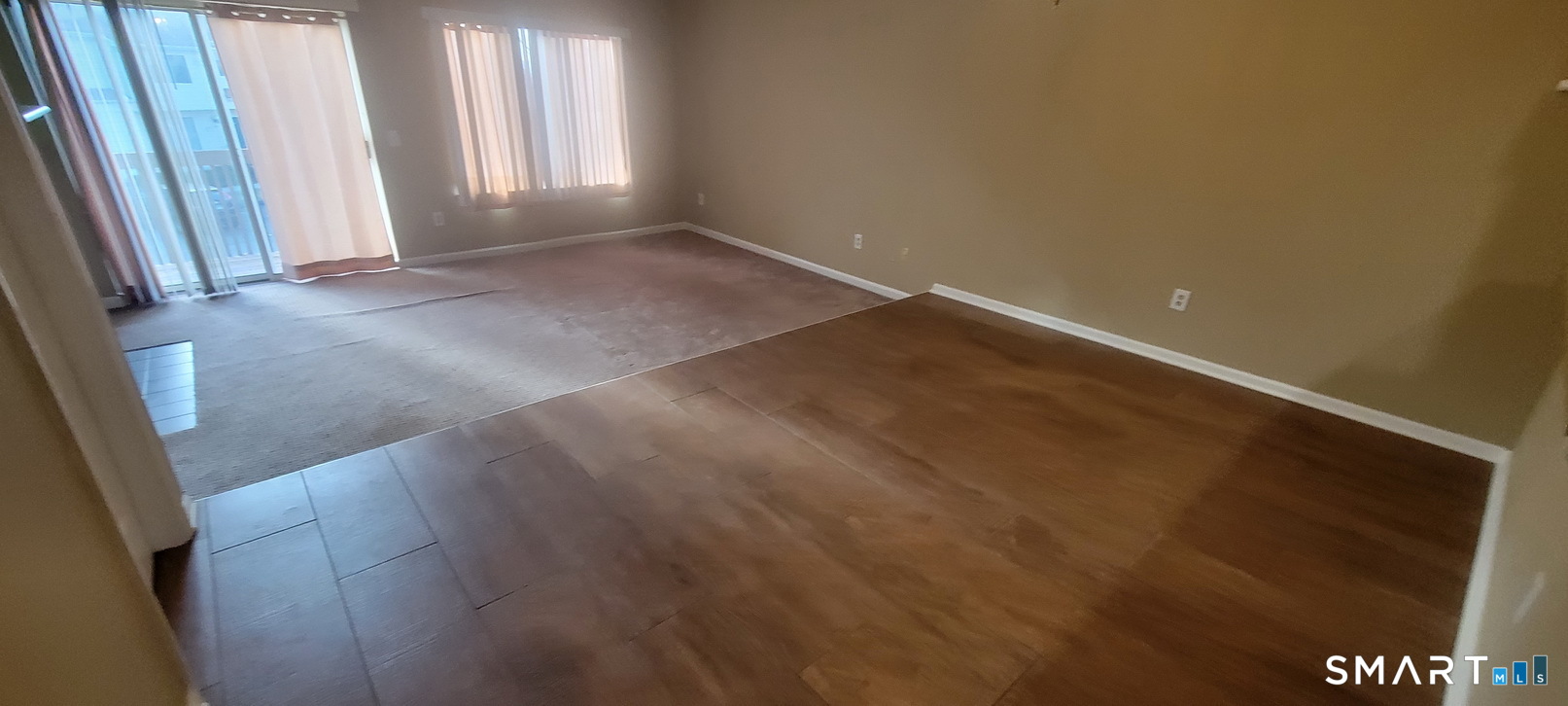 166 Old Brookfield Road, Unit 314 Danbury, CT 06811 - Photo 10 of 37 an empty room with windows