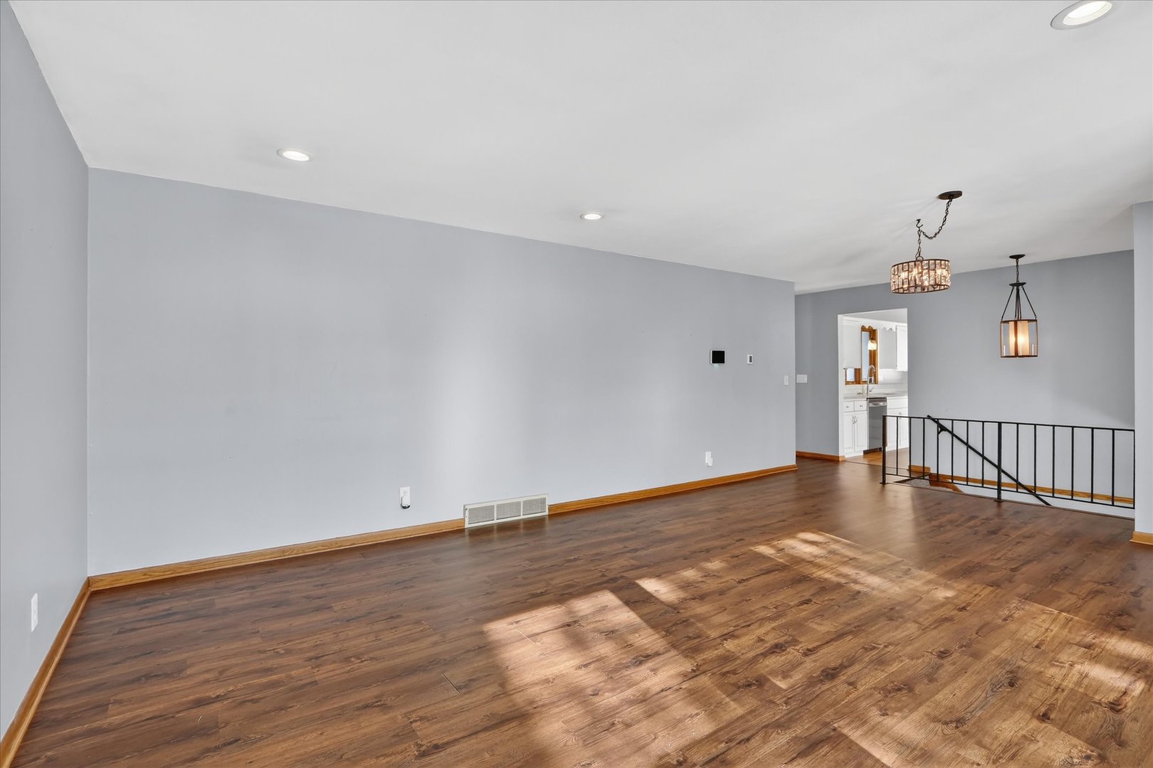5103 Brookview Road Rockford, IL 61107 - Photo 8 of 51 a view of empty room with wooden floor and fan