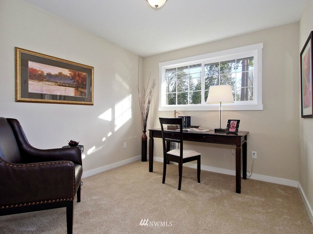 18430 Southeast 135th Street Renton, WA 98059 - Photo 8 of 13 a view of a workspace with furniture and a window