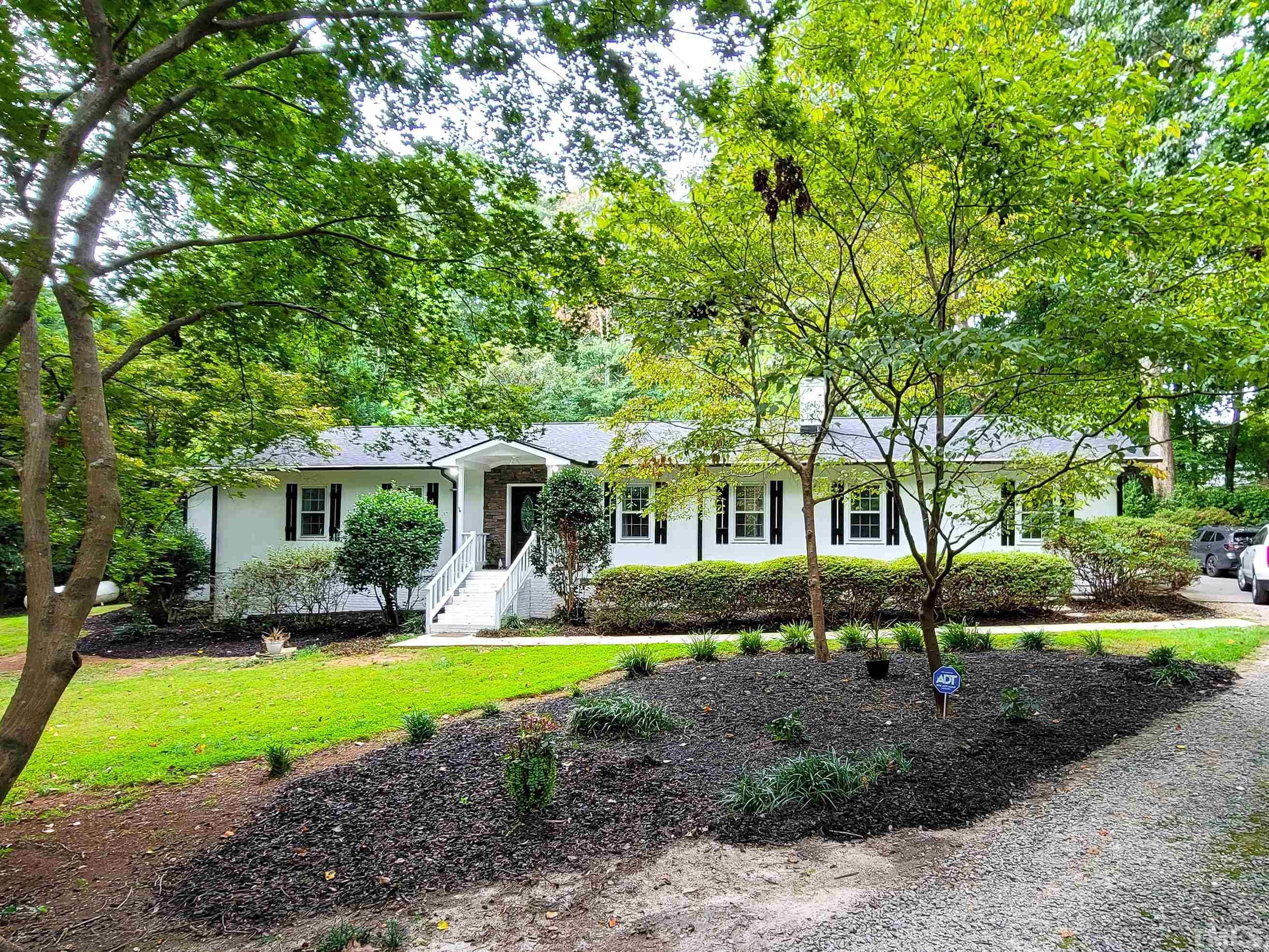 front view of a house with a yard