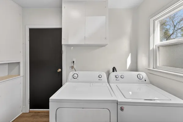 a utility room with dryer and washer