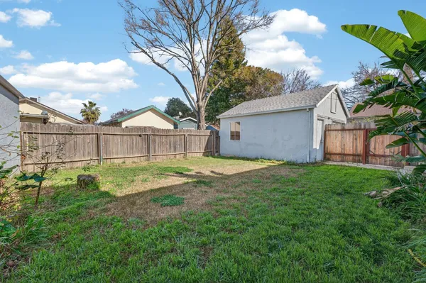 a view of a backyard with a garden