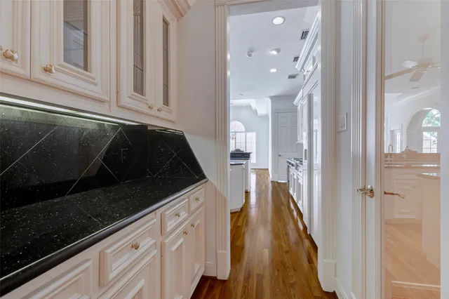 a view of entryway with wooden floor and stairs