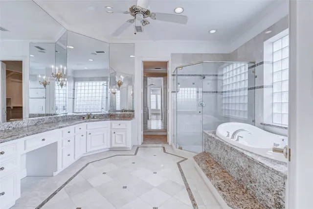 a view of empty room with wooden floor and window