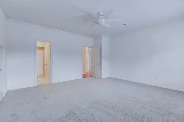 a bathroom with a granite countertop sink mirror and vanity