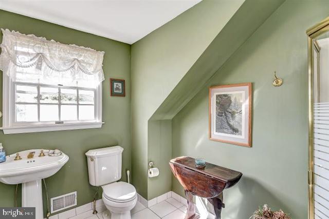 596 Province Line Road Allentown, NJ 08501 - Photo 18 of 50 a bathroom with a toilet sink and mirror