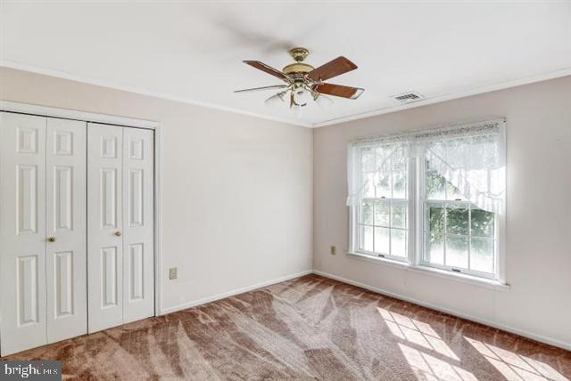 596 Province Line Road Allentown, NJ 08501 - Photo 20 of 50 a view of a livingroom with a ceiling fan and window