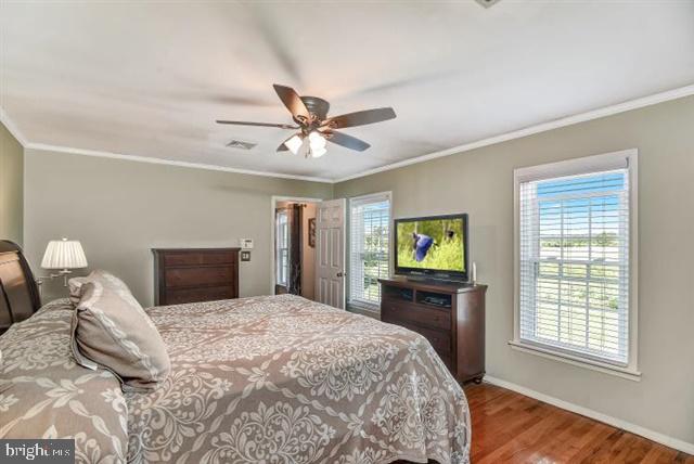 596 Province Line Road Allentown, NJ 08501 - Photo 24 of 50 a bedroom with a large bed and a tv