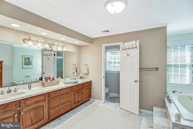 596 Province Line Road Allentown, NJ 08501 - Photo 25 of 50 a spacious bathroom with a double vanity sink mirror double and shower