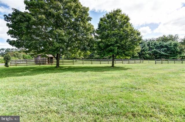 596 Province Line Road Allentown, NJ 08501 - Photo 28 of 50 a view of a green field with wooden fence