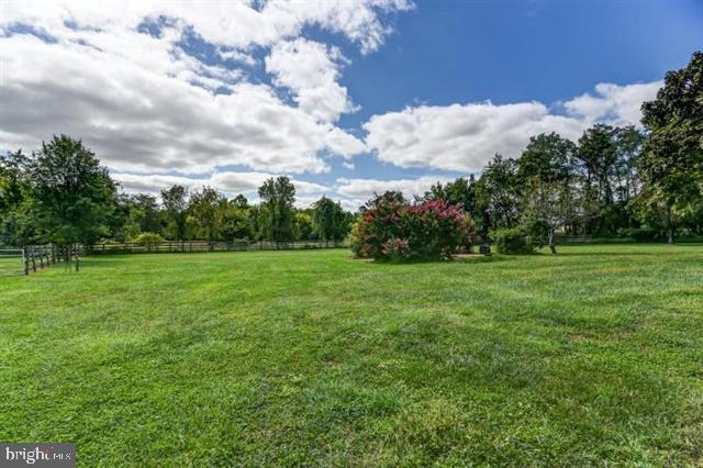 596 Province Line Road Allentown, NJ 08501 - Photo 29 of 50 a view of a green field with wooden fence