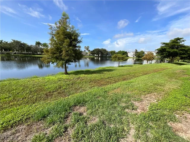 a view of lake background with houses
