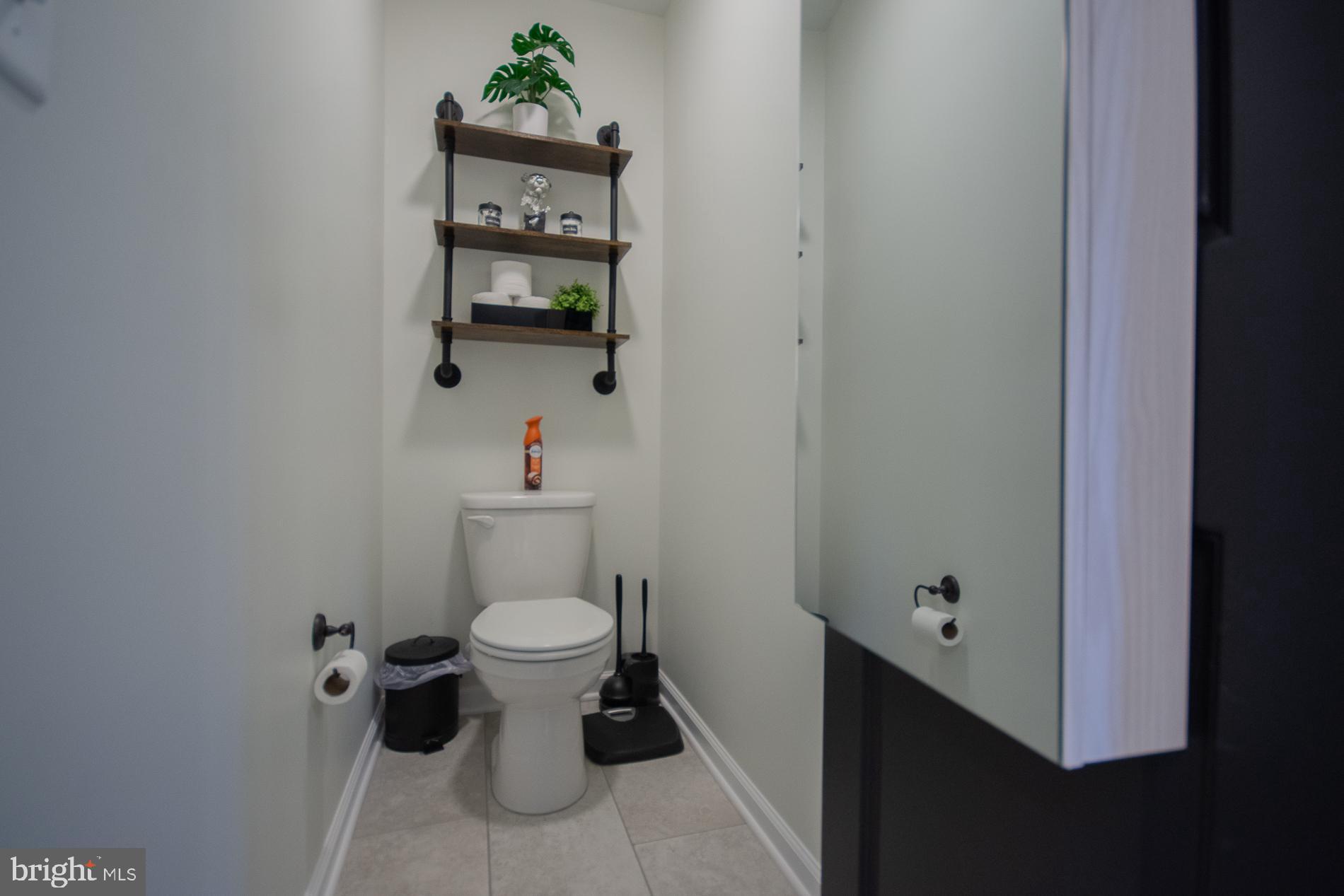 90 Larimar Lane Inwood, WV 25428 - Photo 23 of 66 a bathroom with a toilet and a sink
