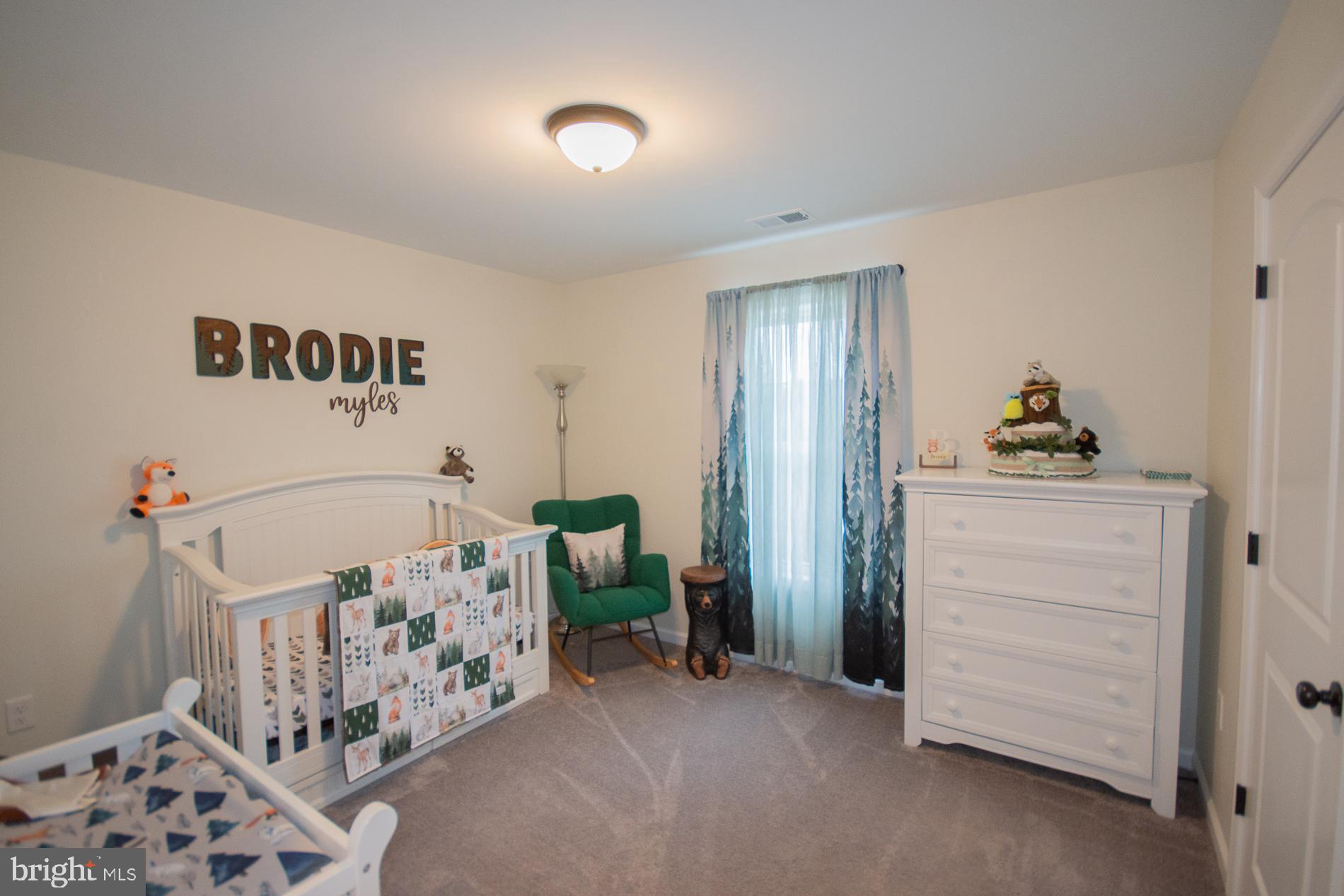 90 Larimar Lane Inwood, WV 25428 - Photo 33 of 66 a bedroom with a bed and a window