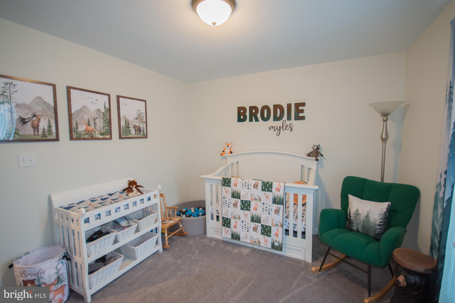 90 Larimar Lane Inwood, WV 25428 - Photo 34 of 66 a bedroom with furniture and a baby crib