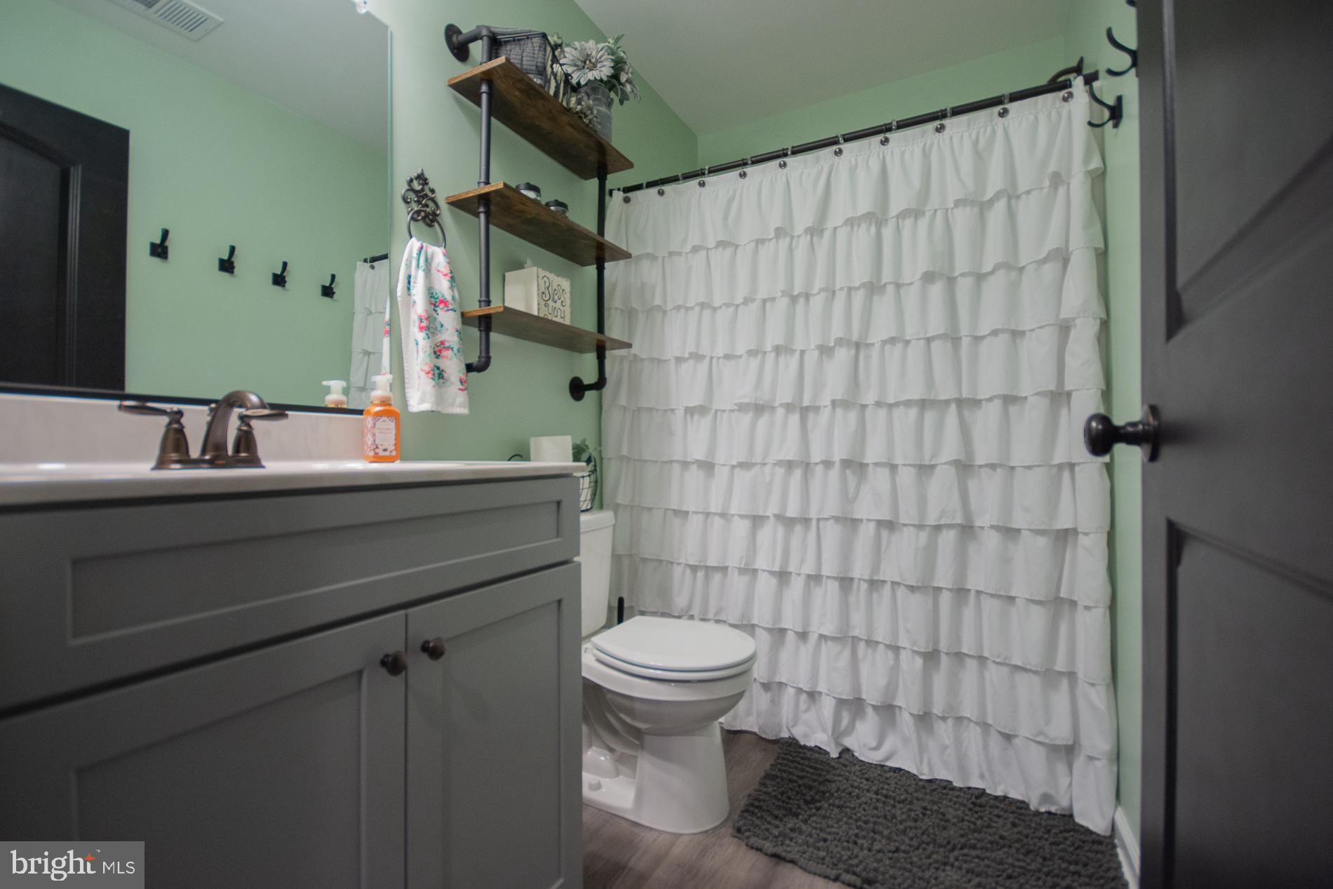 90 Larimar Lane Inwood, WV 25428 - Photo 37 of 66 a bathroom with a sink toilet and shower