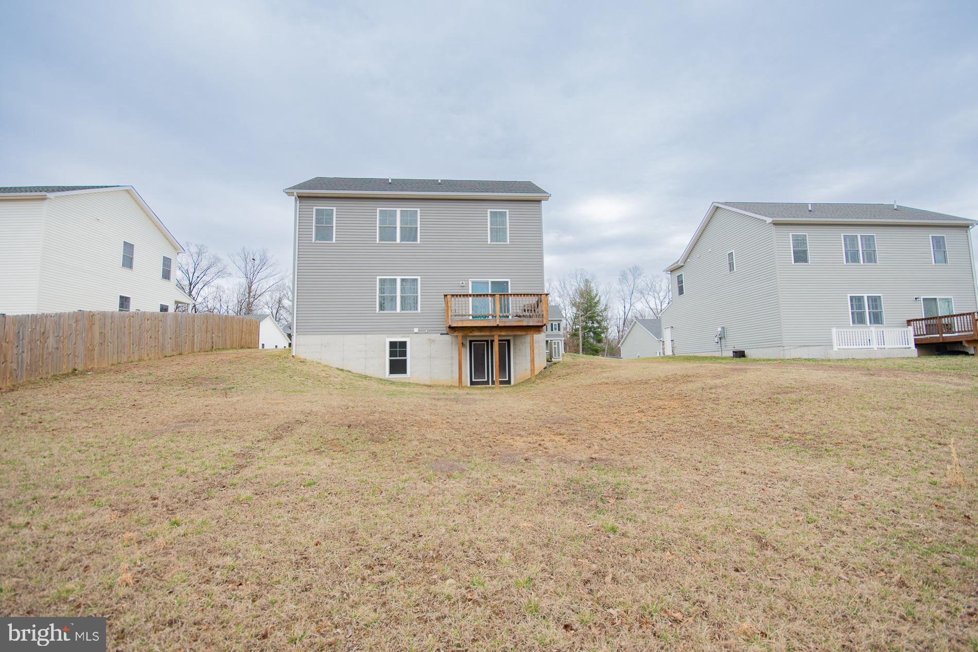 90 Larimar Lane Inwood, WV 25428 - Photo 51 of 66 a view of a big room with cabinet and windows