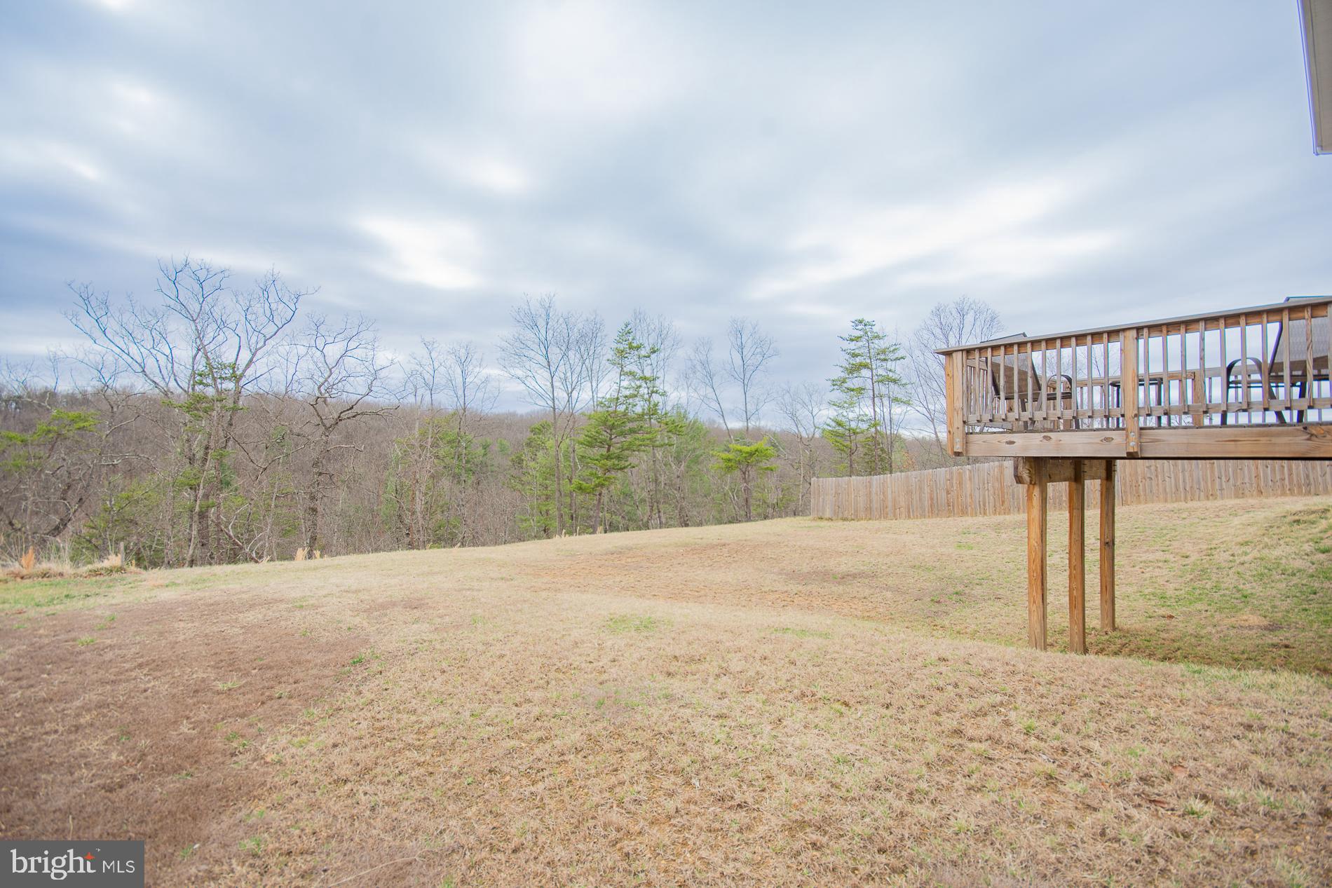 90 Larimar Lane Inwood, WV 25428 - Photo 58 of 66 a terrace with river and trees in the background