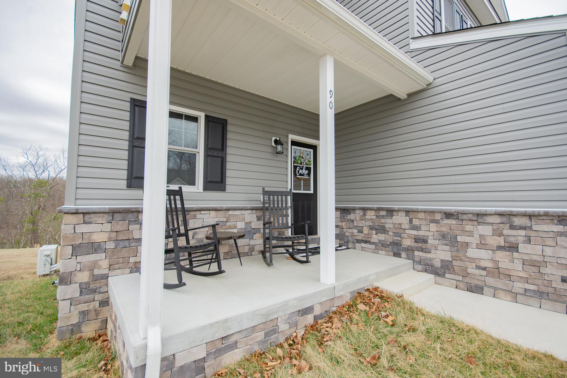 90 Larimar Lane Inwood, WV 25428 - Photo 60 of 66 a view of swimming pool with outdoor seating