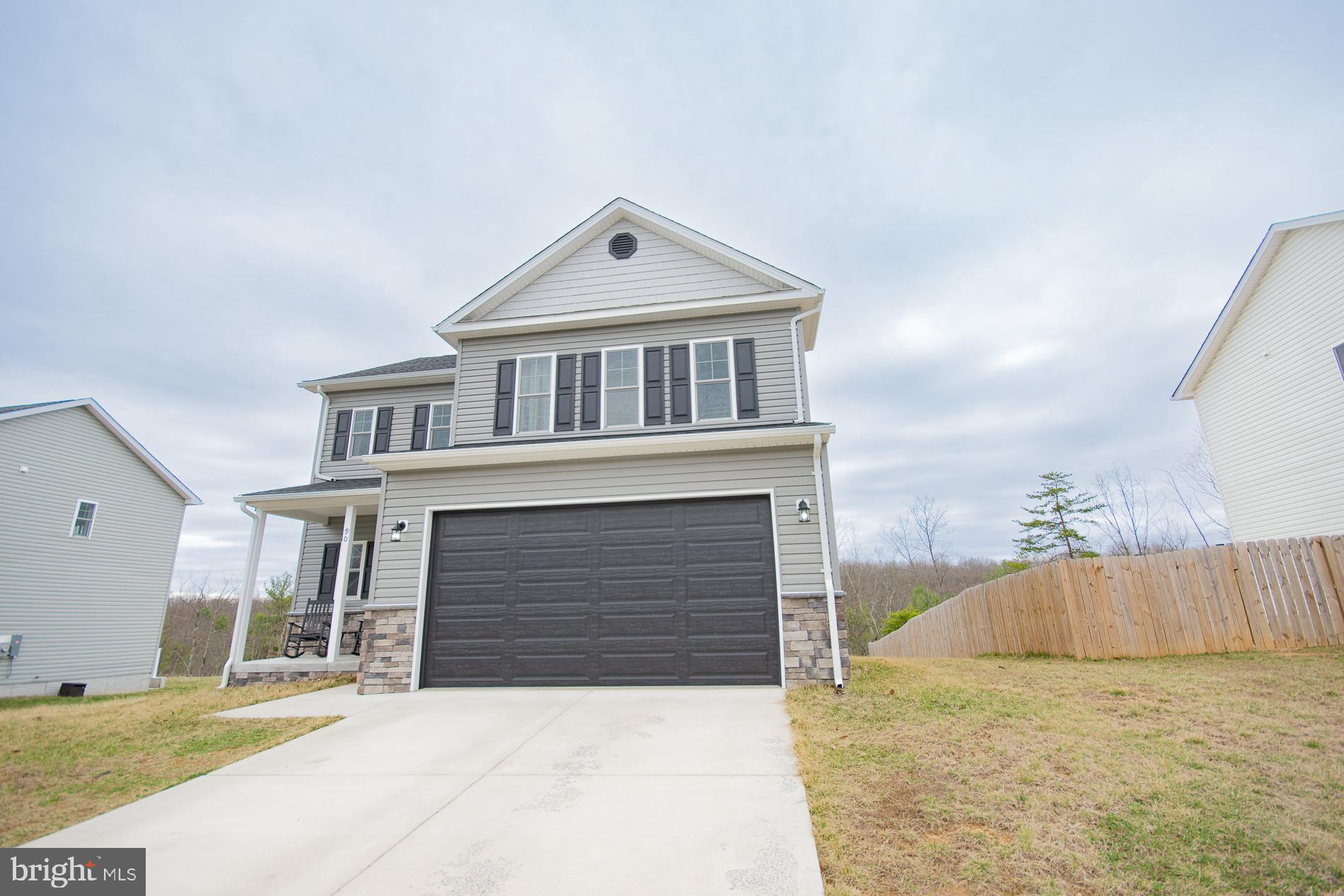 90 Larimar Lane Inwood, WV 25428 - Photo 64 of 66 a front view of a house with a yard