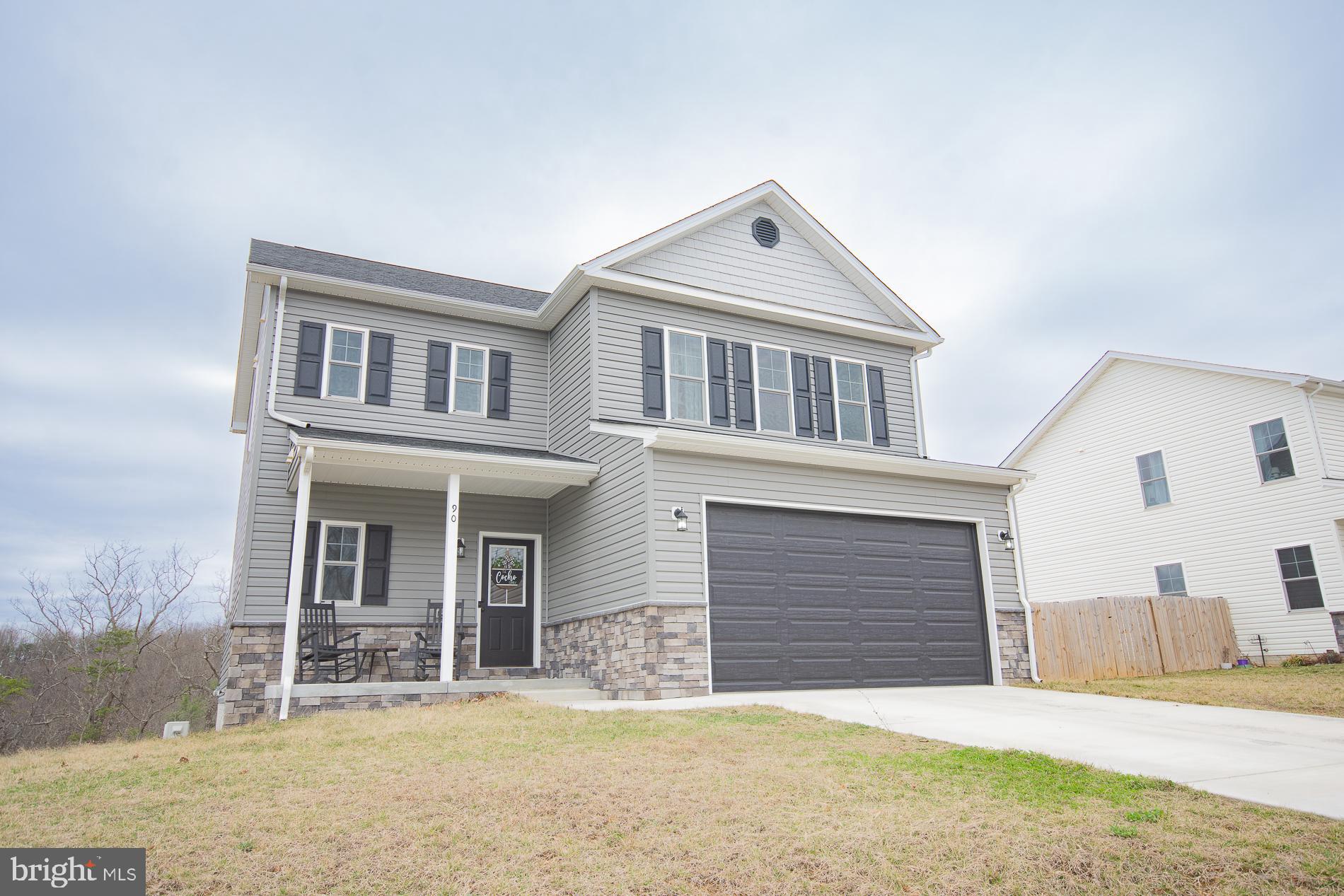 90 Larimar Lane Inwood, WV 25428 - Photo 65 of 66 front view of a house with a yard