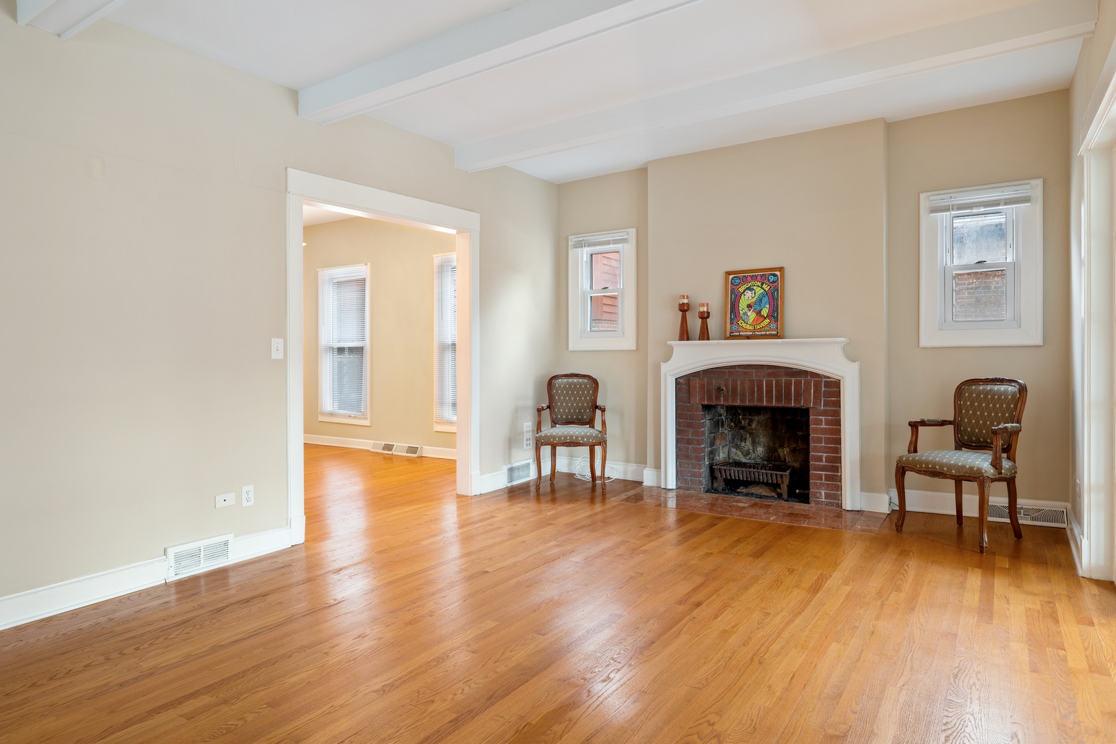 879 Willow Road Winnetka, IL 60093 - Photo 2 of 29 a living room with furniture and a fireplace