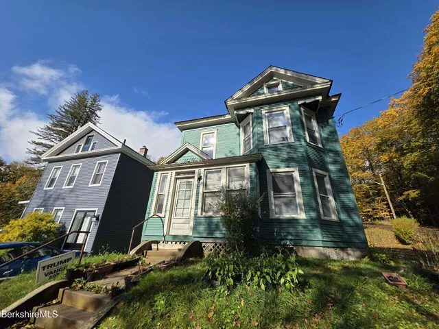 a view of a large building with a clock on the wall