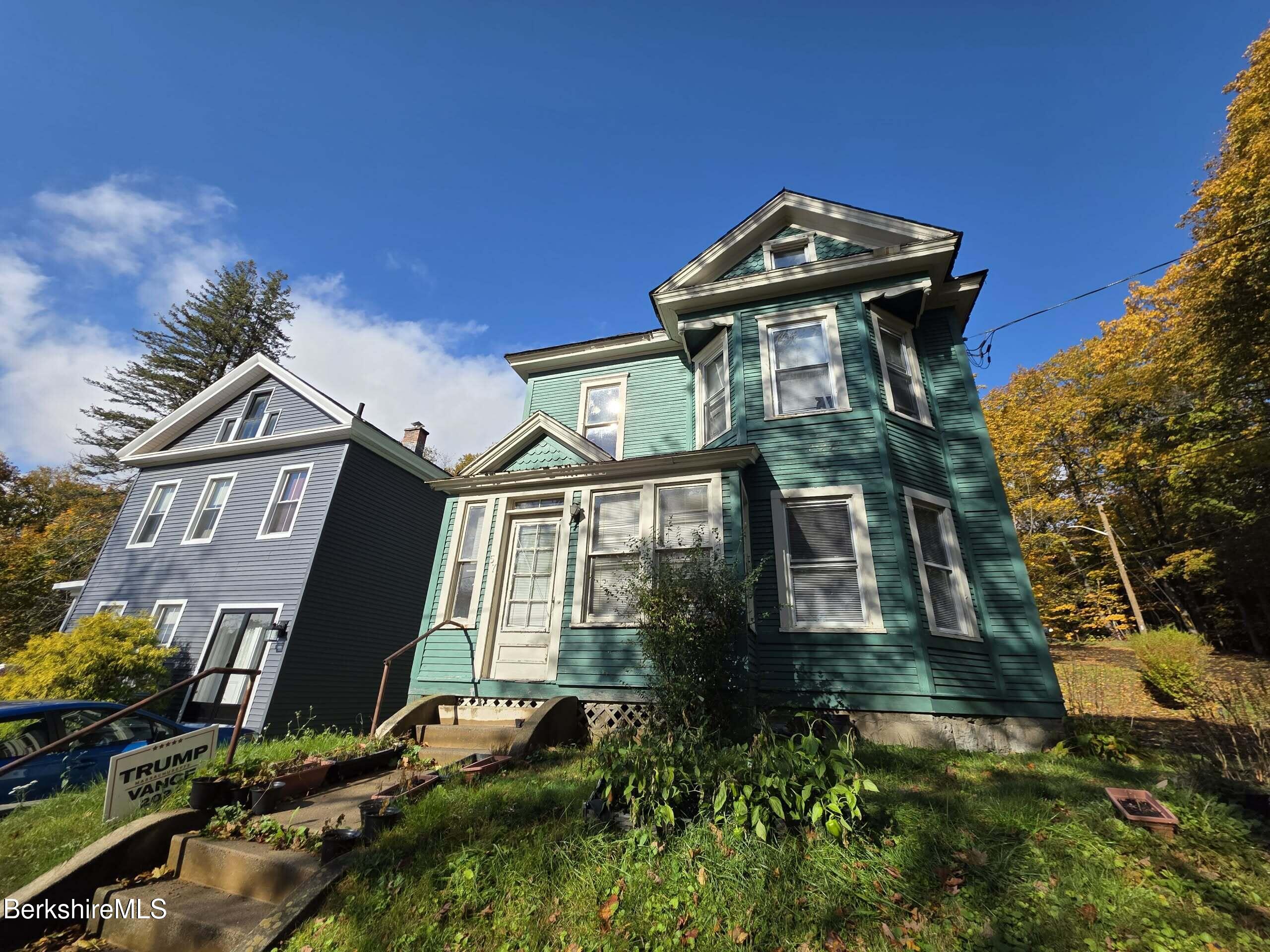 a view of a large building with a clock on the wall