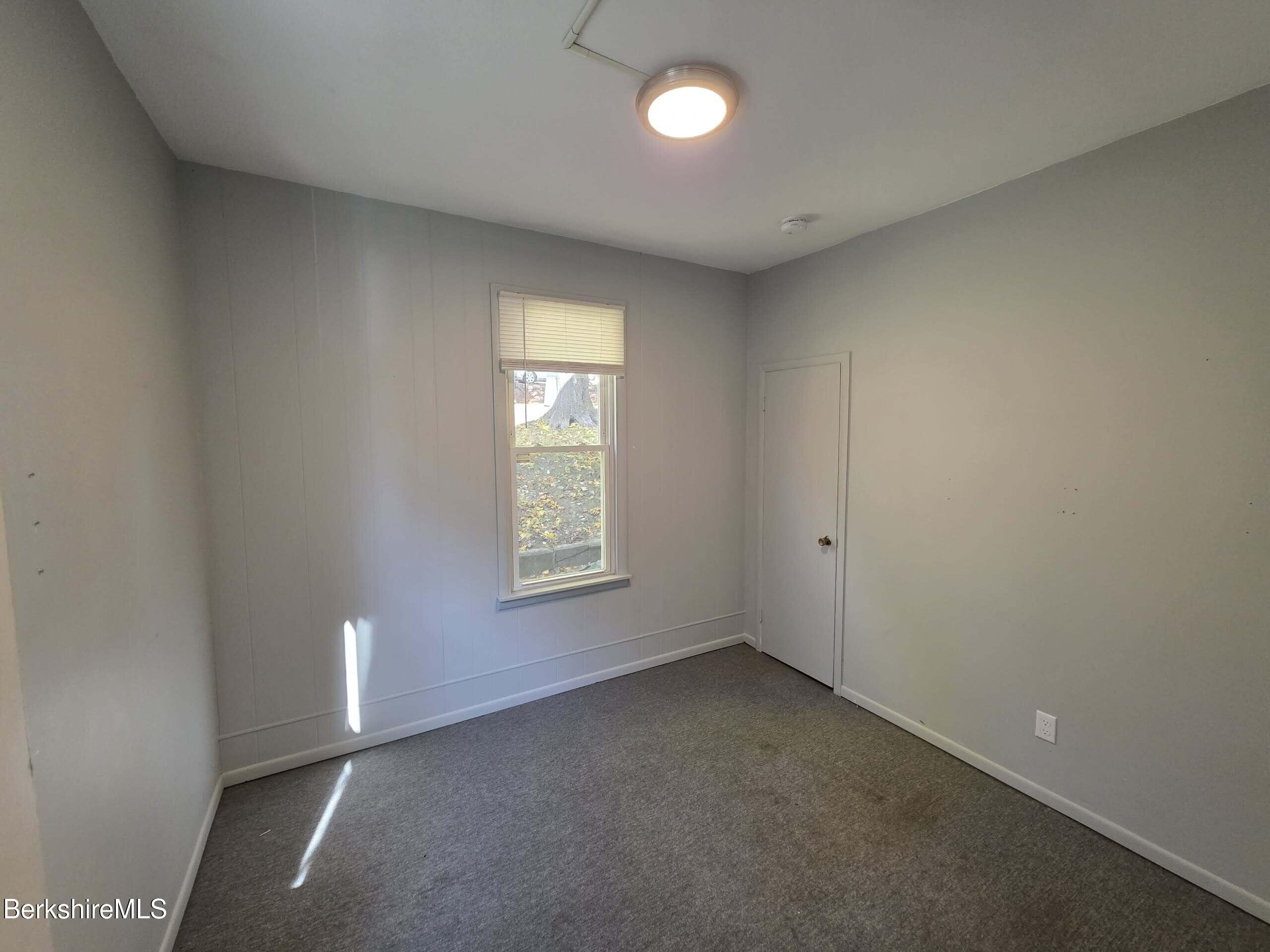 57 Beacon Street, Unit 1 North Adams, MA 01247 - Photo 10 of 10 an empty room with a window