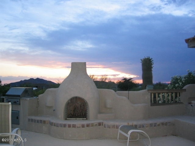 36642 Romping Road Carefree, AZ 85377 - Photo 17 of 19 backyard gas fireplace & bbq