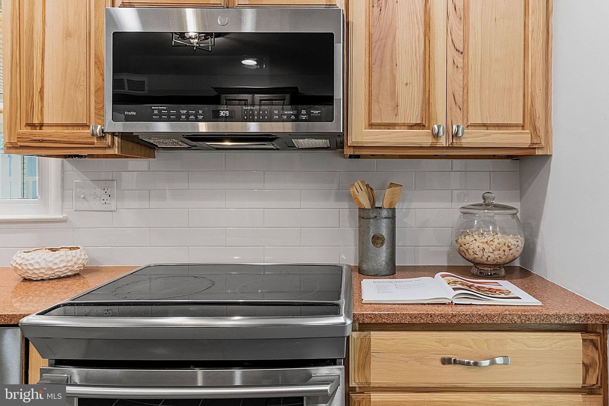 117 Harvest Road Cherry Hill, NJ 08002 - Photo 13 of 35 a stove top oven sitting inside of a kitchen