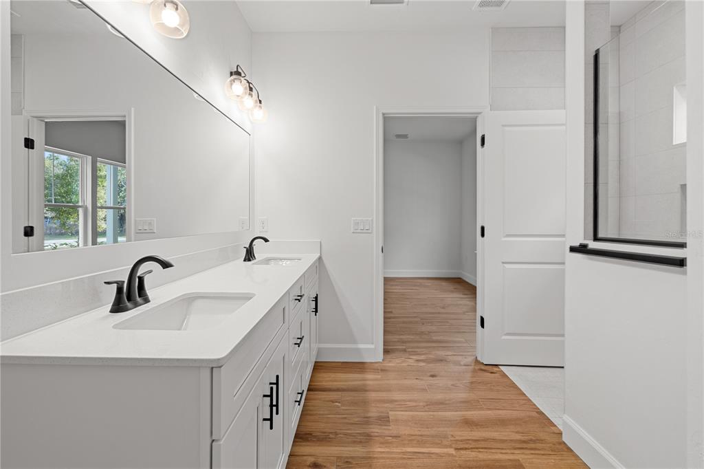 601 Fisher Drive Bronson, FL 32621 - Photo 16 of 32 a bathroom with a sink and a mirror