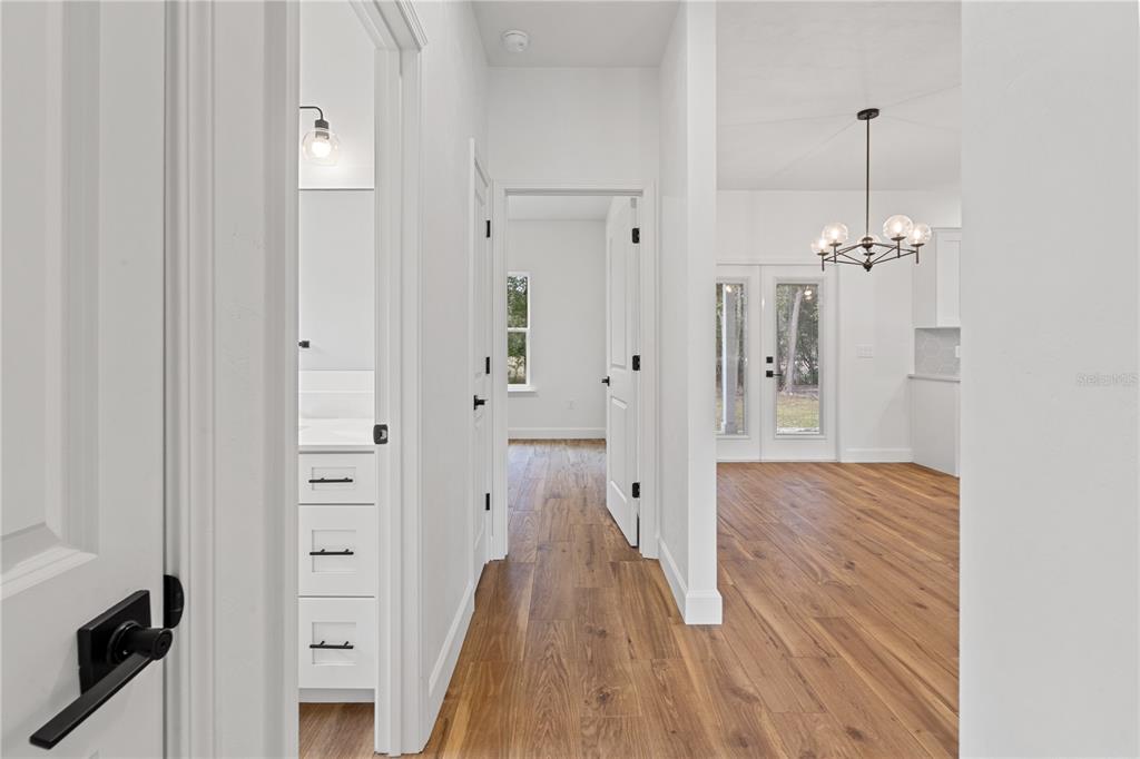 601 Fisher Drive Bronson, FL 32621 - Photo 19 of 32 a view of a room with wooden floor and staircase