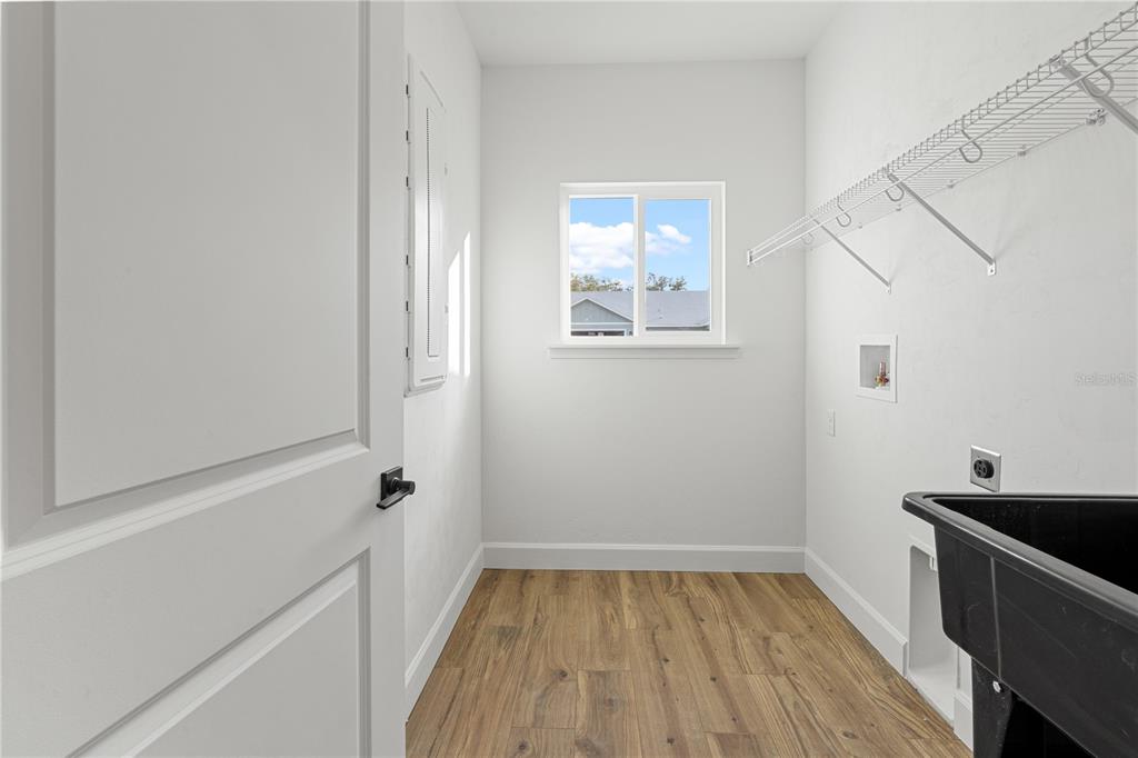 601 Fisher Drive Bronson, FL 32621 - Photo 24 of 32 a view of a room with wooden floor and window