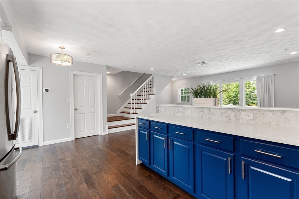 2 Ricciuti Drive, Unit 9 Quincy, MA 02169 - Photo 18 of 40 a view of kitchen with wooden floor