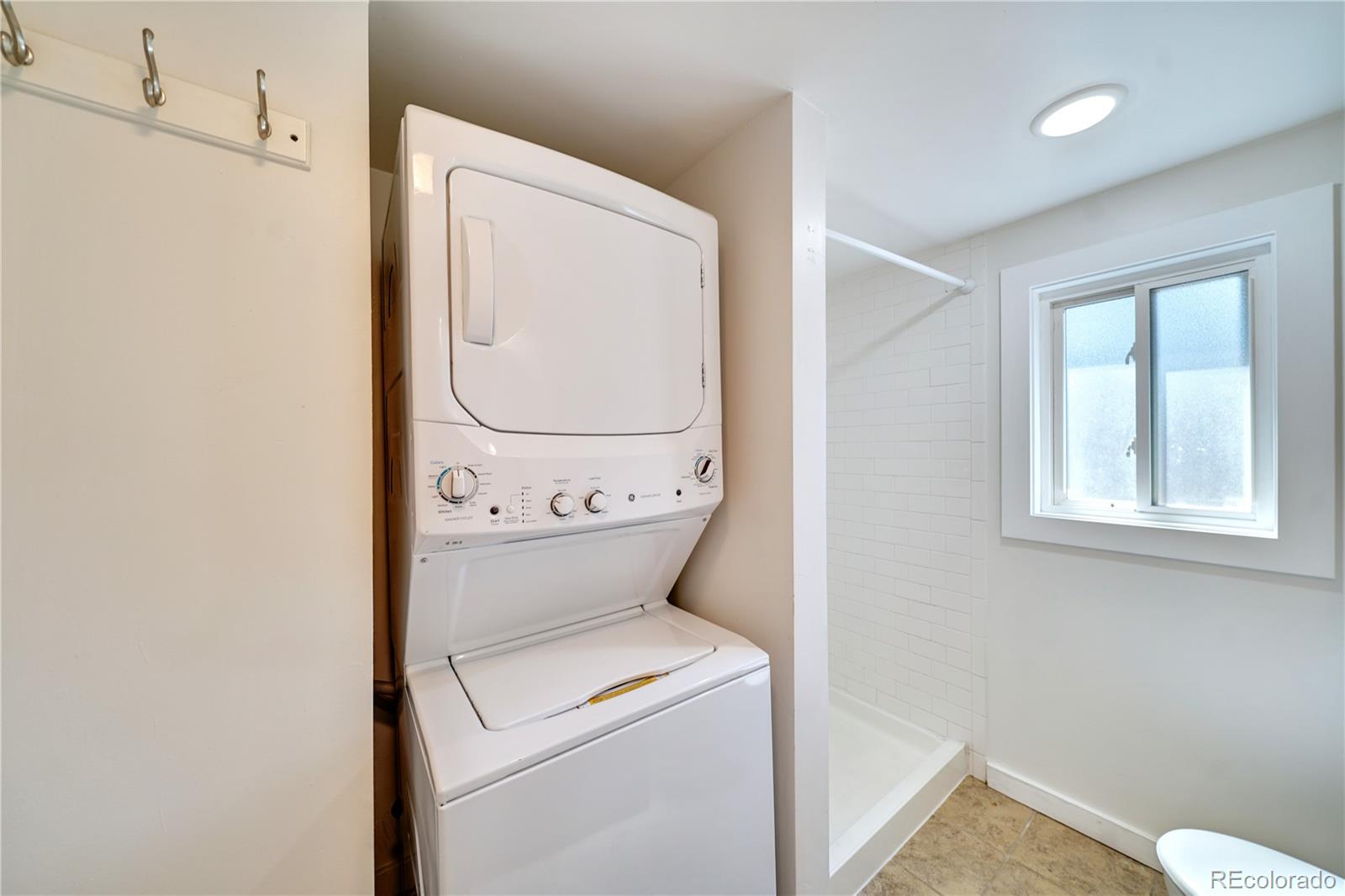 2528 West 23rd Avenue, Unit B Denver, CO 80211 - Photo 8 of 11 a utility room with dryer and washer