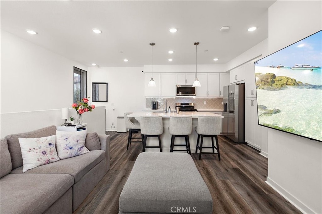 11063 Wander Drive Rancho Cucamonga, CA 91730 - Photo 13 of 28 Open living, dining and kitchen area.